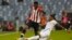 FILE - Athletic Bilbao's Inaki Williams, left, and Real Madrid's David Alaba fight for the ball during the Spanish Super Cup final soccer match between Real Madrid and Athletic Bilbao at King Fahd stadium in Riyadh, Saudi Arabia, Sunday, January 16, 2022.