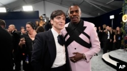 Cillian Murphy, left, and Colman Domingo arrive at the 30th annual Screen Actors Guild Awards on Feb. 24, 2024, at the Shrine Auditorium in Los Angeles. 