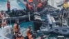 菲律宾武装部队2024年6月17日发布的视频截图照片显示，中国海岸警卫队成员在南中国海第二托马斯沙洲(中国称为仁爱礁)附近冲撞菲律宾海岸警卫队船只并发生暴力冲突。