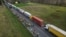 FILE - This aerial photo shows trucks standing near the Polish-Ukrainian border crossing of Dorohusk, Poland, Nov. 10, 2023.