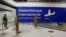 FILE - Soldiers patrol in the arrival area of Juscelino Kubitschek airport in Brasilia, Brazil, March 30, 2023. 