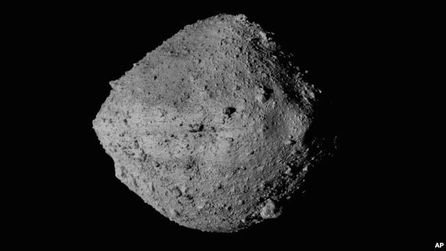 FILE - This undated image provided by NASA shows the asteroid Bennu as seen from the Osiris-Rex spacecraft.