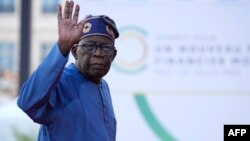 Nigeria President Bola Tinubu arrives for the closing session of the New Global Financial Pact Summit in Paris, June 23, 2023. 