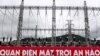 A security guard walks past the substation at Sao Mai solar energy plant in An Giang province, Vietnam, Sept. 25, 2022.