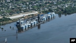 FILE: Grain storage sits underwater after the collapse of the Kakhovka Dam, in Kozatske, in Russian-occupied Ukraine, on June 7, 2023. The United Nations said on June 26, 2023 that renewing the Ukraine grain export agreement is vital to Africa's hungry population.. 