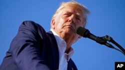 FILE - Former President Donald Trump speaks at a campaign rally at Waco Regional Airport, March 25, 2023, in Waco, Texas. 