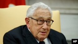 FILE - Former U.S. Secretary of State Henry Kissinger speaks during a meeting with then-President Donald Trump in the Oval Office of the White House, Oct. 10, 2017, in Washington. Kissinger died Nov. 29, 2023, at his Connecticut home. He was 100.