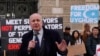 FILE - British lawmaker Iain Duncan Smith joins activists and community members as they hold a small protest outside the British Foreign Office in central London, Feb. 13, 2023. 