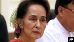 FILE - Myanmar's leader Aung San Suu Kyi attends the bilateral meeting with Chinese President Xi Jinping at the president house in Naypyitaw Myanmar, on Jan. 18, 2020.