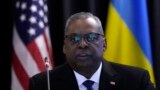 FILE - U.S. Defense Secretary Lloyd Austin delivers his speech during the opening of the meeting of the Ukraine Defense Contact Group at Ramstein Air Base, in Ramstein, Germany, April 21, 2023. 