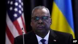 US Defense Secretary Lloyd Austin delivers his speech during the opening of the meeting of the Ukraine Defense Contact Group at Ramstein Air Base in Ramstein, Germany, April 21, 2023.