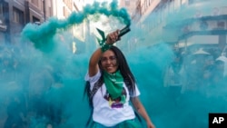 A woman participates in an abortion-rights demonstration during the Day for Decriminalization of Abortion, in Mexico City, Sept. 28, 2023. 