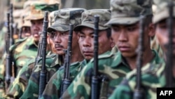 FILE - Members of the ethnic rebel Taang National Liberation Army train in a forest in Myanmar's northern Shan state, March 8, 2023. The rebels are part of an alliance called the Federal Political Negotiation and Consultative Committee.