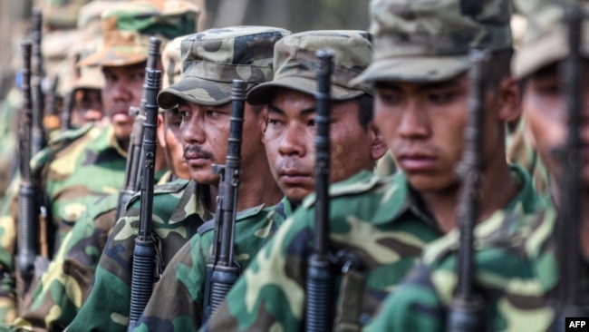FILE - Members of the ethnic rebel Taang National Liberation Army train in a forest in Myanmar's northern Shan state, March 8, 2023. The rebels are part of an alliance called the Federal Political Negotiation and Consultative Committee.