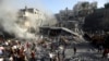 Palestinians look for survivors following an Israeli airstrike at the Khan Younis refugee camp, southern Gaza Strip, Nov. 7, 2023.