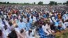FILE - Nigerian Muslim attend Eid al-Adha prayers at an open field in Lagos, Nigeria, Wednesday, June 28, 2023.