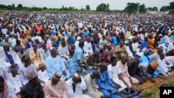 FILE - Nigerian Muslim attend Eid al-Adha prayers at an open field in Lagos, Nigeria, Wednesday, June 28, 2023.