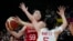 China's Wang Siyu attempts too block a shot from Japan's Anri Hoshi, left, during the Asia Cup women's basketball final in Sydney, Australia, July 2, 2023.