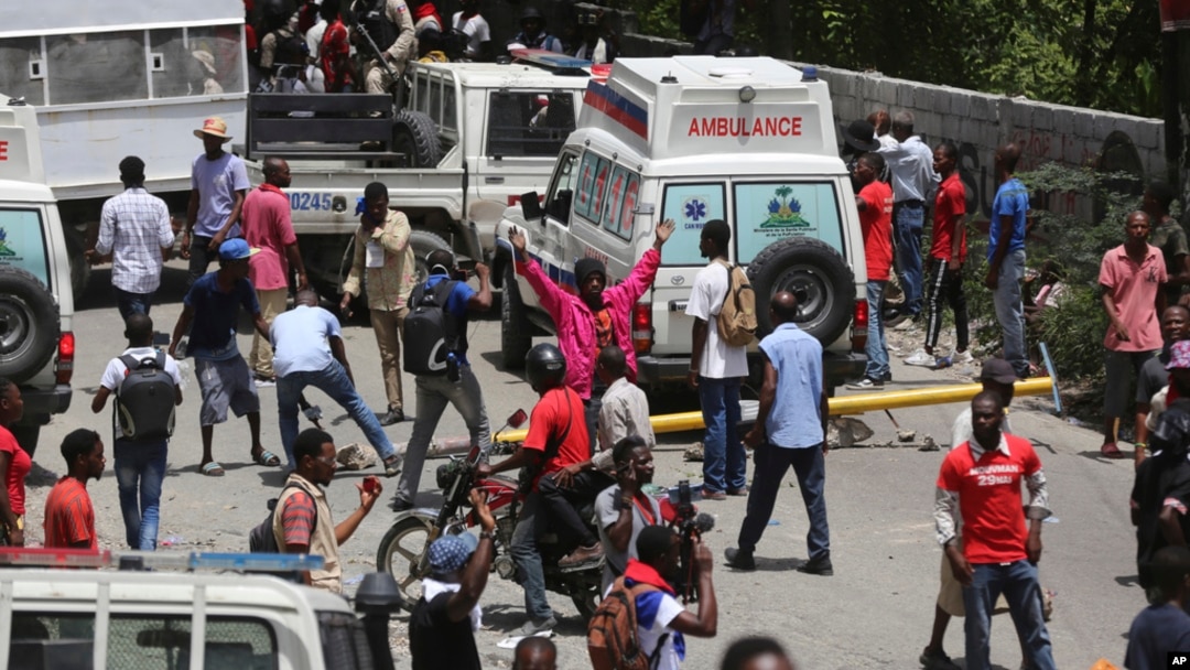 Demonstrators fill the streets during a protest to demand the resignation of Prime Minister Ariel Henry, in Port-au-Prince, Haiti, July 20, 2023. 