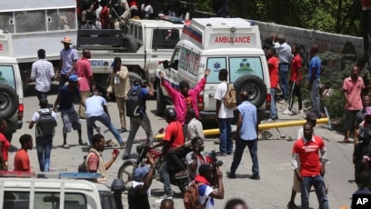 Demonstrators fill the streets during a protest to demand the resignation of Prime Minister Ariel Henry, in Port-au-Prince, Haiti, July 20, 2023. 