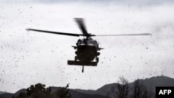 ILUSTRASI - Sembilan tentara dilaporkan tewas dalam kecelakaan dua helikopter HH60 Black Hawk Angkatan Darat AS di Kentucky selama misi pelatihan, Kamis, 30 Maret 2023. (Handout / Satff Sgt.Jeffrey Beggs/DoD / AFP)