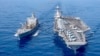 FILE - USS Gerald R. Ford aircraft carrier refuels from the underway replenishment oiler USNS Laramie in the eastern Mediterranean Sea, Oct. 11, 2023. (U.S. Navy photo via AP)