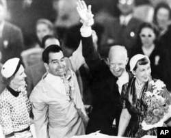 FILE - Dwight D. Eisenhower, second from right, and Richard Nixon, R-Calif., second from left, celebrate their nomination for President and Vice President of the United States with their wives at the 1952 Republican Convention in Chicago, Ill., July 12, 1952. (AP Photo)