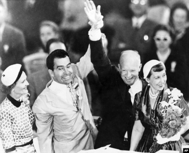 FILE - Dwight D. Eisenhower, second from right, and Richard Nixon, R-Calif., second from left, celebrate their nomination for President and Vice President of the United States with their wives at the 1952 Republican Convention in Chicago, Ill., July 12, 1952. (AP Photo)