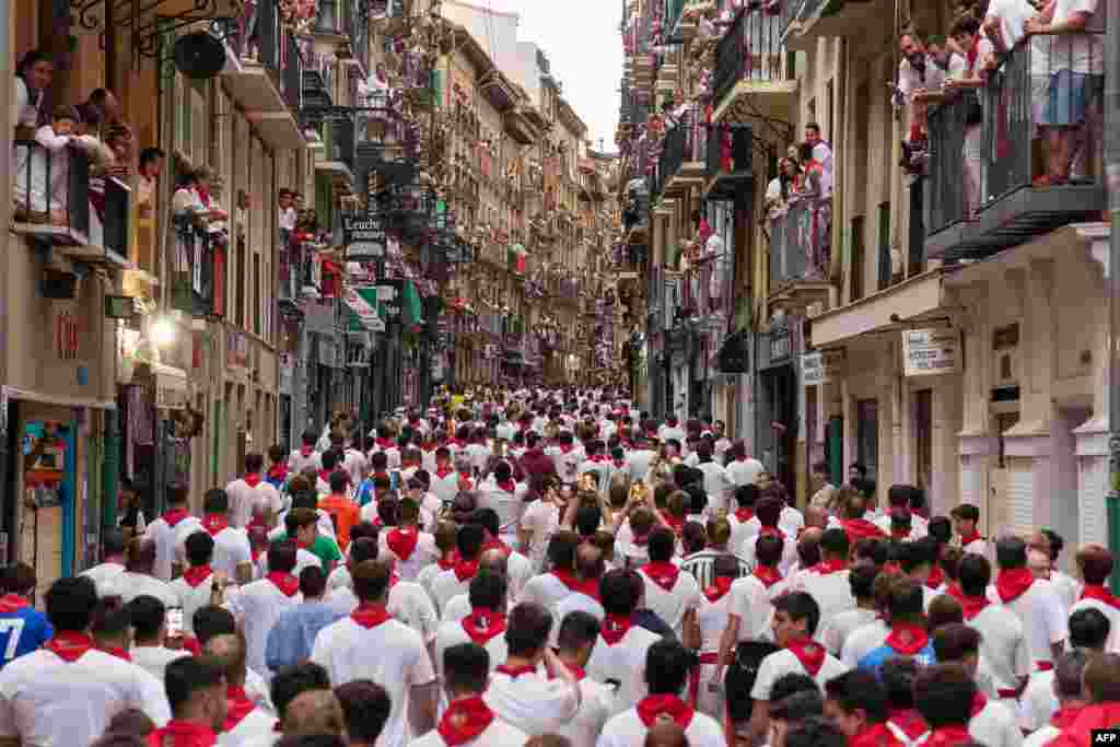 Participants prepare to run during the &quot;encierro&quot; (bull-run) of the San Fermin festival in Pamplona, northern Spain.