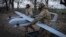FILE - Ukrainian soldiers prepare to launch a Poseidon H10 middle-range drone near the city of Bakhmut, in Ukraine’s Donetsk region, March 26, 2024.