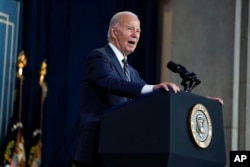 President Joe Biden speaks at the Department of the Interior in Washington, Dec. 6, 2023.