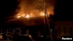 A view of a fire at plant in Korenevo, Kursk, Russia, that produces electrical devices, amid Russia's attack on Ukraine, in this screen grab obtained by Reuters from social media video released July 16, 2024