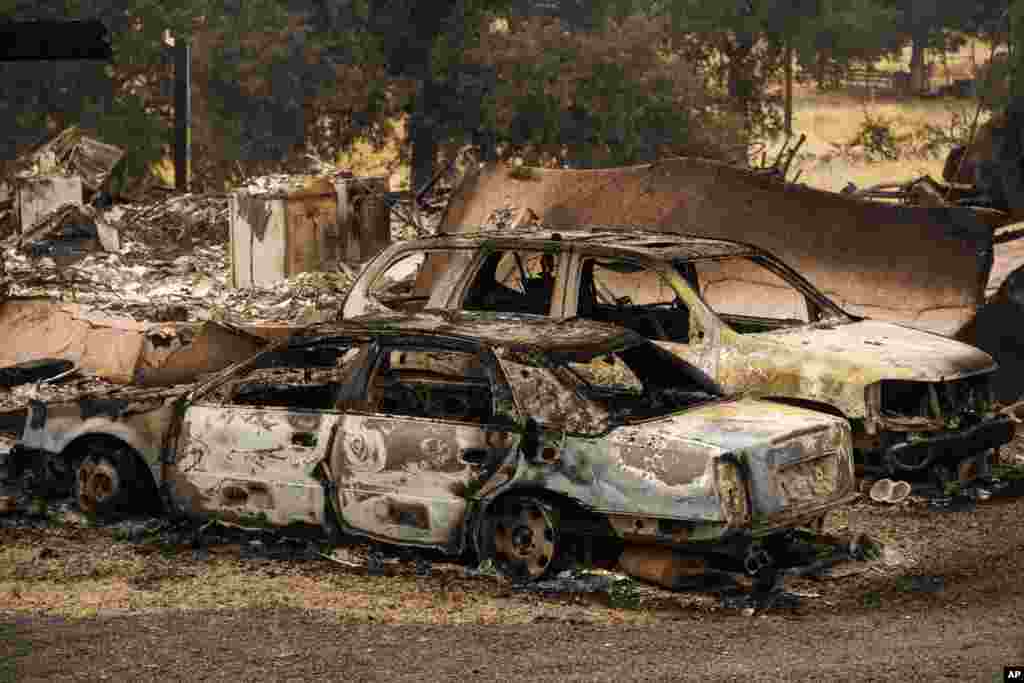 The charred vehicles by the Apache Fire sit parked in Palermo, California, Jun. 25, 2024. 