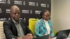 FILE - Amnesty International's Tigere Chagutah, interim regional director for East and southern Africa (L), and Vongai Chikwanda, interim deputy regional director of campaigns for southern Africa, pictured at a press conference in Johannesburg, South Africa, March 27, 2023.
