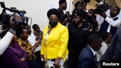 Karamoja Affairs Minister Mary Goretti Kitutu arrives at the Anti-Corruption Court where she was charged with fraud and causing loss of public property in the diversion of roofing sheets meant for the poor, in Kololo, Kampala, Uganda, April 6, 2023.
