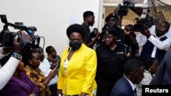 FILE — Karamoja Affairs Minister Mary Goretti Kitutu, 61, arrives at the Anti-Corruption Court where she was charged with fraud and causing loss of public property in the diversion of roofing sheets meant for the poor, in Kololo, Kampala, Uganda, April 6, 2023.