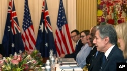 U.S. Secretary of State Antony Blinken talks to Australian Minister of Defense Richard Marles and Australian Foreign Minister Penny Wong in Brisbane, Australia, July 29, 2023.