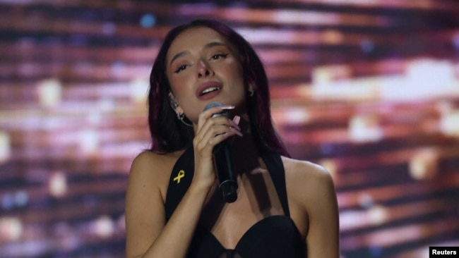 FILE - Eden Golan, Israel's representative for the 2024 Eurovision Song Contest in Malmo sings during the final stage of 'Rising Star', the Israeli Eurovision national selection show, in Neve Ilan, Feb. 6, 2024.