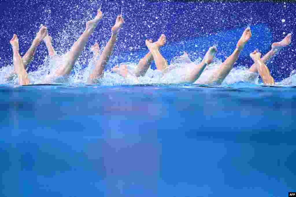 Team Slovakia competes in the preliminary round of the team technical artistic swimming event during the 2024 World Aquatics Championships at Aspire Dome in Doha, Qatar.