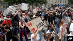 FILE - Demonstrators protest the death of George Floyd on June 2, 2020, near the White House in Washington. New research ranks the United States among the 50 most conflict-ridden nations in 2023.