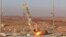 This photo released by the Iranian Defense Ministry on Dec. 6, 2023, claims to show a rocket with a capsule capable of carrying animals, being launched from an undisclosed location into orbit.