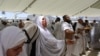 Muslims at Hajj Pilgrimage Brave Intense Heat to Cast Stones at Pillars Representing the Devil 