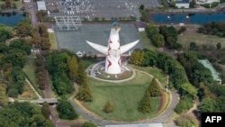 FILE - This Oct. 12, 2023, photo shows the 'Tower of the Sun' by Japanese artist Taro Okamoto. It was the symbol of the 1970 Osaka Expo and now the location of the Expo Commemoration Park in Suita, Osaka prefecture.