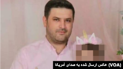 آرام عمری بردیانی، زندانی محکوم به اعدام و کودکی که در آغوش دارد.