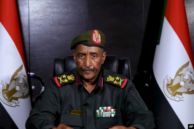 FILE - In this image made from video provided April 21, 2023, by the Sudan Armed Forces, Gen. Abdel-Fattah Burhan, commander of the Sudanese Armed Forces, speaks at an undisclosed location in his first speech since fighting in Sudan began nearly a week ago.