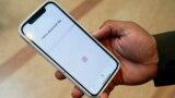 Kai Koerber shows his app, Joy, on July 27, 2023, in Berkeley, Calif. Koerber was a student at Marjory Stoneman Douglas High School when a gunman killed 17 people there in 2018, and has designed an app to help with mental health. 
