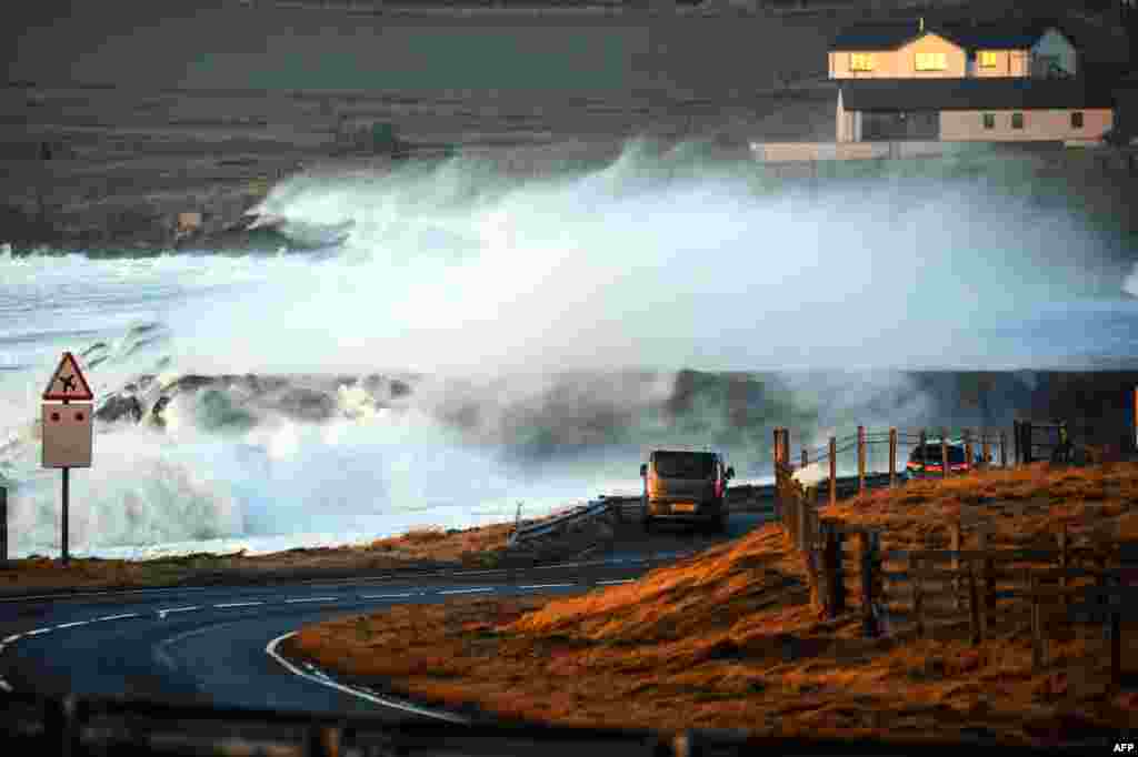 Waves break over the end of the runway at Sumburgh Airport in Sumburgh, Shetland Islands, as severe weather from Storm Ingunn affects flights and ferry travel.