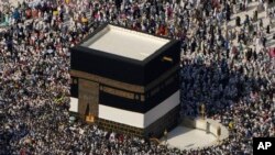 FILE—Thousands of Muslim pilgrims circumambulate the Kaaba, the cubic building at the Grand Mosque during the annual Hajj pilgrimage in Mecca, Saudi Arabia, June 30, 2023. 