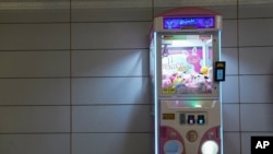 A claw machine sits inside a metro station in Rio de Janeiro, Aug. 28, 2024.