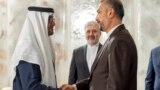 This handout image provided by the UAE's Presidential Court shows UAE's President Sheikh Mohamed bin Zayed al-Nahyan, left, meeting with Iran's Foreign Minister Hossein Amir-Abdollahian, in Abu Dhabi, June 22, 2023. 